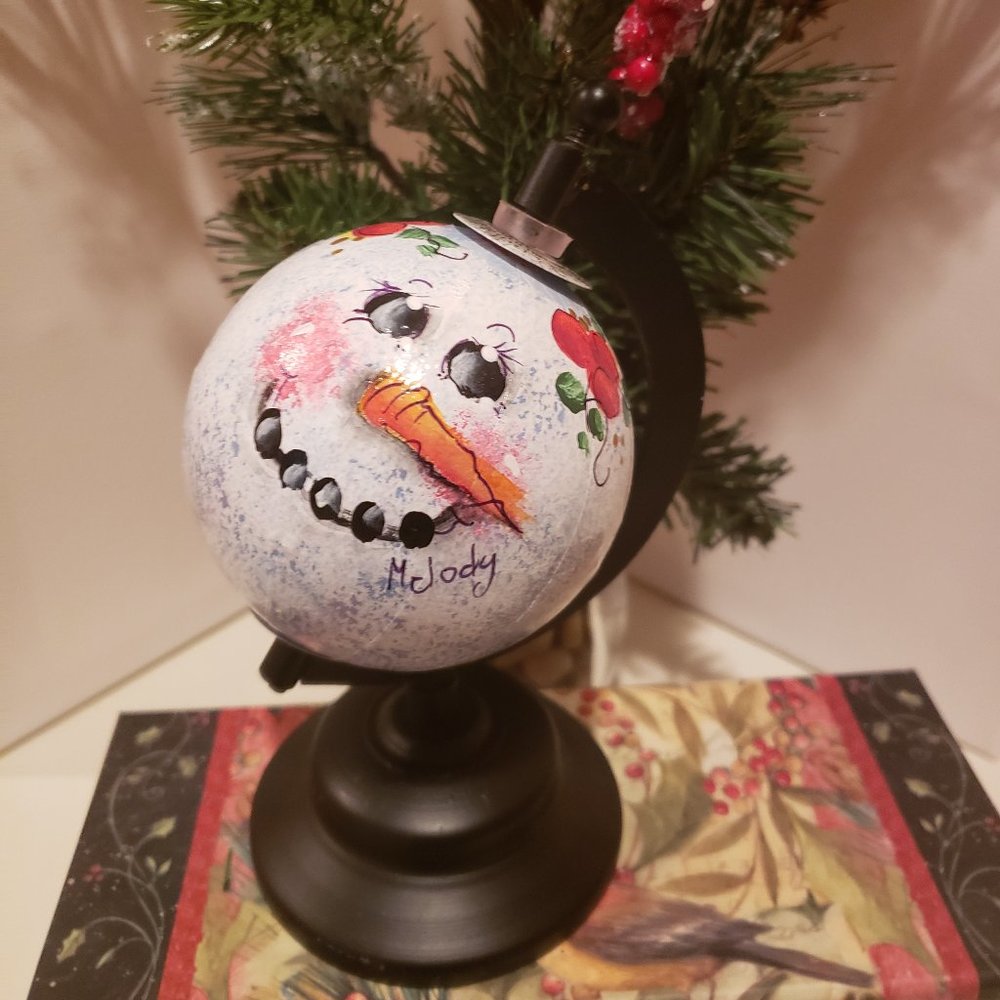 "What In The World" Snowman Globe